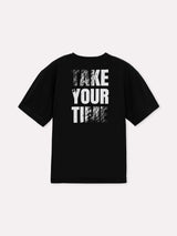 T-shirt oversize con scritte